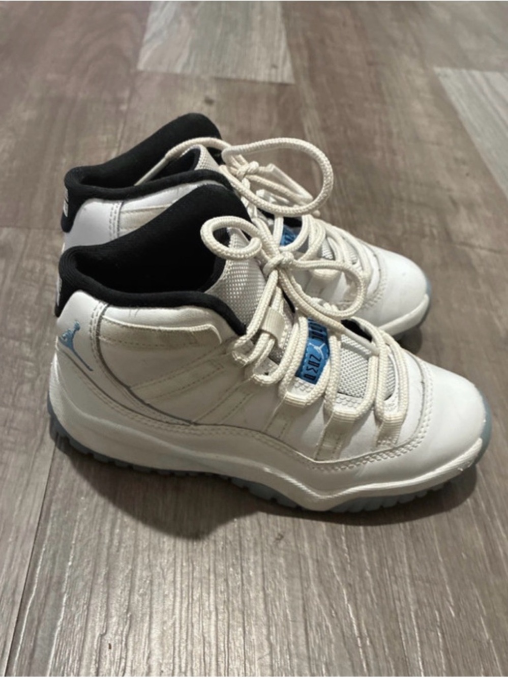 Jordan Kids White and Black High-Top Sneakers with Blue Accents